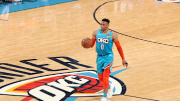 OKLAHOMA CITY, OK - APRIL 19: Russell Westbrook #0 of the Oklahoma City Thunder handles the ball against the Portland Trail Blazers during Game Three of Round One of the 2019 NBA Playoffs on April 19, 2019 at Chesapeake Energy Arena in Oklahoma City, Oklahoma. NOTE TO USER: User expressly acknowledges and agrees that, by downloading and/or using this photograph, user is consenting to the terms and conditions of the Getty Images License Agreement. Mandatory Copyright Notice: Copyright 2019 NBAE (Photo by Joe Murphy/NBAE via Getty Images)