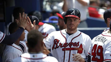 Jun 16, 2016; Atlanta, GA, USA; Atlanta Braves first baseman Freddie Freeman (5) celebrates his run scored in the 7th inning of their game against the Cincinnati Reds at Turner Field. The Braves won 7-2. Mandatory Credit: Jason Getz-USA TODAY Sports