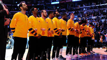 LOS ANGELES, CA - JANUARY 8: The Los Angeles Lakers stands for a moment of silence for the National Anthem before the game against the Orlando Magic on January 8, 2017 at STAPLES Center in Los Angeles, California. NOTE TO USER: User expressly acknowledges and agrees that, by downloading and/or using this Photograph, user is consenting to the terms and conditions of the Getty Images License Agreement. Mandatory Copyright Notice: Copyright 2017 NBAE (Photo by Andrew D. Bernstein/NBAE via Getty Images)