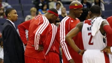 Oct 8, 2013; Washington, DC, USA; Washington Wizards small forward Otto Porter Jr. (left) stands with his team in a huddle during a timeout against the Brooklyn Nets in the third quarter at Verizon Center. The Nets won 111-106 in overtime. Mandatory Credit: Geoff Burke-USA TODAY Sports