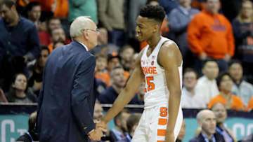 NEW YORK, NY - MARCH 06: Tyus Battle (25) of the Syracuse Orange shakes hands with head coach Jim Boeheim of the Syracuse Orange after leaving the game late in the second half during the first round of the ACC Men's Basketball Tournament at Barclays Center on March 6, 2018 in New York City. (Photo by Abbie Parr/Getty Images)