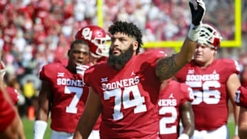 NORMAN, OK - SEPTEMBER 014: Offensive lineman Cody Ford #74 of the Oklahoma Sooners engages the crowd before the game against the Florida Atlantic Owls at Gaylord Family Oklahoma Memorial Stadium on September 1, 2018 in Norman, Oklahoma. The Sooners defeated the Owls 63-14. (Photo by Brett Deering/Getty Images)