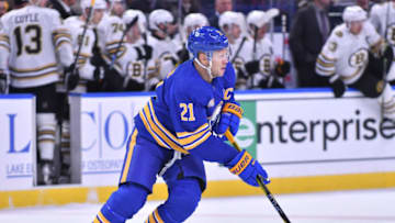 Nov 14, 2023; Buffalo, New York, USA; Buffalo Sabres right wing Kyle Okposo (21) skates with the puck against the Boston Bruins in the first period at KeyBank Center. Mandatory Credit: Mark Konezny-USA TODAY Sports