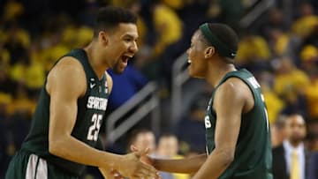 ANN ARBOR, MICHIGAN - FEBRUARY 24: Cassius Winston #5 and Kenny Goins #25 of the Michigan State Spartans react after a 77-70 win over the Michigan Wolverines at Crisler Arena on February 24, 2019 in Ann Arbor, Michigan. (Photo by Gregory Shamus/Getty Images)
