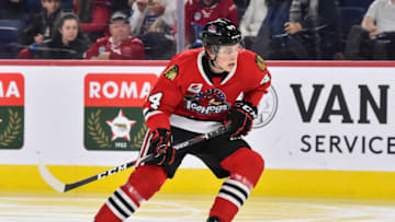 LAVAL, QC - DECEMBER 17: MacKenzie Entwistle #44 of the Rockford IceHogs skates against the Laval Rocket during the second period at Place Bell on December 17, 2019 in Laval, Canada. The Rockford IceHogs defeated the Laval Rocket 3-2 in the shoot-out. (Photo by Minas Panagiotakis/Getty Images)