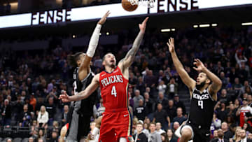 SACRAMENTO, CALIFORNIA - JANUARY 04: JJ Redick #4 of the New Orleans Pelicans makes the game winning shot over Richaun Holmes #22 and Cory Joseph #9 of the Sacramento Kings in the final seconds of their game at Golden 1 Center on January 04, 2020 in Sacramento, California. NOTE TO USER: User expressly acknowledges and agrees that, by downloading and/or using this photograph, user is consenting to the terms and conditions of the Getty Images License Agreement. (Photo by Ezra Shaw/Getty Images)