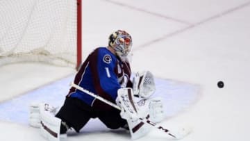 Mar 9, 2016; Denver, CO, USA; Colorado Avalanche goalie Semyon Varlamov (1) prepares to make a glove save in the second period against the Anaheim Ducks at the Pepsi Center. Mandatory Credit: Ron Chenoy-USA TODAY Sports