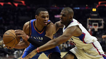 Nov 2, 2016; Los Angeles, CA, USA; Los Angeles Clippers guard Chris Paul (right) attempts to foul Oklahoma City Thunder guard Russell Westbrook (left) during the fourth quarter at Staples Center. The Oklahoma City Thunder won 85-83. Mandatory Credit: Kelvin Kuo-USA TODAY Sports