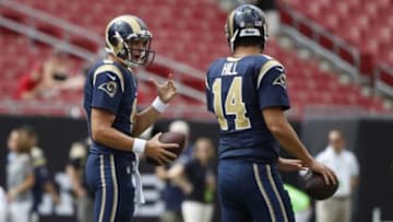 Sep 14, 2014; Tampa, FL, USA; St. Louis Rams quarterback Austin Davis (9) and quarterback Shaun Hill (14) talk prior to the game at Raymond James Stadium. Mandatory Credit: Kim Klement-USA TODAY Sports