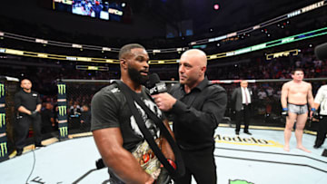 DALLAS, TX - SEPTEMBER 08: UFC welterweight champion Tyron Woodley is interviewed by Joe Rogan after defeating Darren Till of England in their UFC welterweight championship fight during the UFC 228 event at American Airlines Center on September 8, 2018 in Dallas, Texas. (Photo by Josh Hedges/Zuffa LLC/Zuffa LLC via Getty Images)