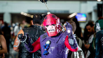 A fan cosplays as a Sentinel from X-Men (Photo by Roy Rochlin/Getty Images)