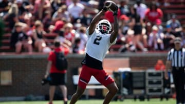Cincinnati Bearcats wide receiver Dee Wiggins catches a pass during the Cincinnati Bearcats spring scrimmage at Nippert Stadium. The Enquirer.