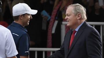 Sep 27, 2015; Atlanta, GA, USA; Jordan Spieth greets NBC commentator Johnny Miller after winning the final round of the Tour Championship by Coca-Cola at East Lake Golf Club. Mandatory Credit: John David Mercer-USA TODAY Sports
