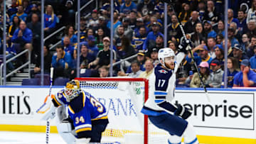 ST. LOUIS, MO - OCTOBER 04: Winnipeg Jets' Adam Lowry, right, celebrates scoring a short-handed goal as St. Louis Blues goaltender Jake Allen looks on during the third period of an NHL hockey game between the St. Louis Blues and the Winnipeg Jets on October 4, 2018, at the Enterprise Center in St. Louis, MO. (Photo by Tim Spyers/Icon Sportswire via Getty Images)