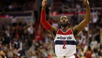 Jan 9, 2015; Washington, DC, USA; Washington Wizards guard John Wall (2) in the closing minute of the fourth quarter against the Chicago Bulls at Verizon Center. The Wizards won 102-86. Mandatory Credit: Geoff Burke-USA TODAY Sports