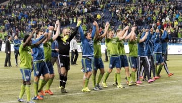 Oct 28, 2015; Seattle, WA, USA; The Seattle Sounders FC celebrate with the fans after defeating the Los Angeles Galaxy at CenturyLink Field. Seattle defeated Los Angeles 3-2. Mandatory Credit: Steven Bisig-USA TODAY Sports