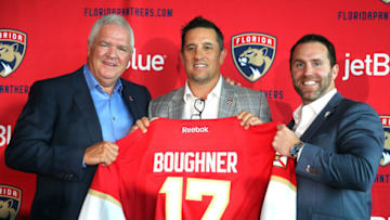 Florida Panthers new coach Bob Boughner, center, with GM Gale Tallon and CEO Matthew Caldwell as the team holds a press conference to annouce the new coach at the BB