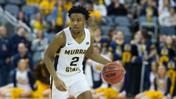 Murray State's Chico Carter, Jr. (2) dribbles the ball as the Murray State Racers play the Austin Peay Governors during their semifinal game of the Ohio Valley Conference Championships at Ford Center Friday evening, March 6, 2020.Ovc Austinpeayvsmurray 21