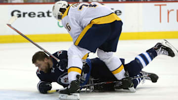 WINNIPEG, MANITOBA - MAY 1: Blake Wheeler #26 of the Winnipeg Jets battles P.K. Subban #76 of the Nashville Predators in Game Three of the Western Conference Second Round during the 2018 NHL Stanley Cup Playoffs on May 1, 2018 at Bell MTS Place in Winnipeg, Manitoba, Canada. (Photo by Jason Halstead /Getty Images) *** Local Caption *** Blake Wheeler; P.K. Subban