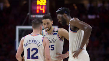 PHILADELPHIA, PA - MAY 7: T.J. McConnell #12 of the Philadelphia 76ers talks to Ben Simmons #25 and Joel Embiid #21 in the fourth quarter against the Boston Celtics during Game Four of the Eastern Conference Second Round of the 2018 NBA Playoffs at Wells Fargo Center on May 7, 2018 in Philadelphia, Pennsylvania. The 76ers defeated the Celtics 103-92. NOTE TO USER: User expressly acknowledges and agrees that, by downloading and or using this photograph, User is consenting to the terms and conditions of the Getty Images License Agreement. (Photo by Mitchell Leff/Getty Images)