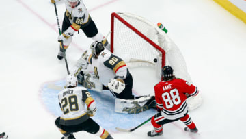 Patrick Kane #88 of the Chicago Blackhawks watches a shot get past Robin Lehner #90 of the Vegas Golden Knights at 4:08 of the first period in Game Four of the Western Conference First Round. (Photo by Jeff Vinnick/Getty Images)