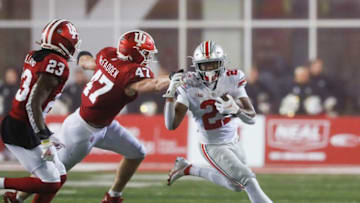 Ohio State Buckeyes running back Evan Pryor (21) runs past Indiana Hoosiers linebacker Micah McFadden (47) during the third quarter of the NCAA football game at Memorial Stadium in Bloomington, Ind. on Saturday, Oct. 23, 2021.Ohio State Buckeyes At Indiana Hoosiers