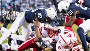 UNIVERSITY PARK, PA - NOVEMBER 18: Devine Ozigbo #22 of the Nebraska Cornhuskers scores a touchdown to give Nebraska the lead 10-7 against the Penn State Nittany Lions during the first quarter on November 18, 2017 at Beaver Stadium in University Park, Pennsylvania. (Photo by Brett Carlsen/Getty Images)