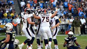 CARSON, CA - NOVEMBER 18: The special teams line converge on kicker Brandon McManus #8 of the Denver Broncos after his kick won the game 23-22 over the Los Angeles Chargers at the StubHub Center November 18, 2018 in Carson, California. (Photo by Joe Amon/The Denver Post via Getty Images)