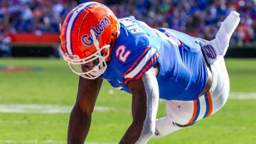 Florida Gators tight end Kemore Gamble (2) dives over the goal line to score a touchdown in the second half to make it 49-42 Gators. The Florida Gators hosted the Samford Bulldogs at Ben Hill Griffin Stadium Saturday afternoon, November 13, 2021 in Gainesville, FL. during the second half of action. [Doug Engle/Ocala Star-Banner]2021Flgai Ufvs Samford Football