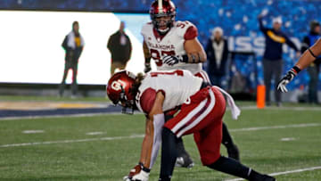 MORGANTOWN, WV - NOVEMBER 23: Caleb Kelly #19 of the Oklahoma Sooners recovers a fumble for a 10 yard touchdown against the West Virginia Mountaineers on November 23, 2018 at Mountaineer Field in Morgantown, West Virginia. (Photo by Justin K. Aller/Getty Images)