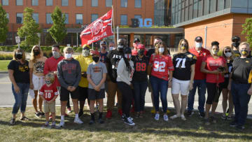 ROSEMONT, ILLINOIS - AUGUST 21: Randy Wade, father of Shaun Wade of the Ohio State Buckeyes, and Big Ten parents pose for photo during a rally outside to the Big Ten Conference headquarters on August 21, 2020 in Rosemont, Illinois. The Big Ten conference made the decision to delay the fall football season until the spring to protect players and staff as transmission of the COVID-19 virus continues to rise. (Photo by Quinn Harris/Getty Images)