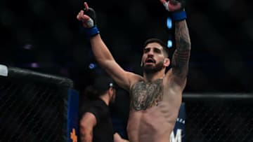 Jul 10, 2021; Las Vegas, Nevada, USA; Ilia Topuria celebrates his knockout victory against Ryan Hall during UFC 264 at T-Mobile Arena. Mandatory Credit: Gary A. Vasquez-USA TODAY Sports