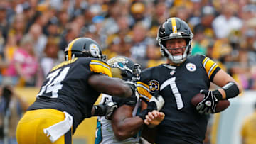 PITTSBURGH, PA - OCTOBER 08: Ben Roethlisberger No. 7 of the Pittsburgh Steelers is wrapped up for a tackle by Dante Fowler No. 56 of the Jacksonville Jaguars in the second half during the game at Heinz Field on October 8, 2017 in Pittsburgh, Pennsylvania. (Photo by Justin K. Aller/Getty Images)