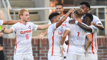 Clemson midfielder Luis Felipe Fernanadez-Salvador, right, congratulates goal-scoring forward Tim Ströbeck (7), with teammates Clemson midfielder Derek Waleffe, left, and Clemson defender Shawn Smart, middle, against USC Upstate during the first half of play at Historic Riggs Field in Clemson Monday, August 29, 2022. Clemson won 2-0.2022 Clemson 2 Vs Usc Upstate 0 Final In Men S Soccer Historic Riggs Field