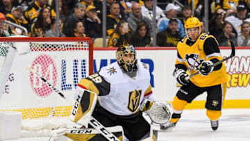 PITTSBURGH, PA - OCTOBER 19: Pittsburgh Penguins Center Sidney Crosby (87) goes to the net in front of Vegas Golden Knights Goalie Marc-Andre Fleury (29) during the second period in the NHL game between the Pittsburgh Penguins and the Vegas Golden Knights on October 19, 2019, at PPG Paints Arena in Pittsburgh, PA. (Photo by Jeanine Leech/Icon Sportswire via Getty Images)
