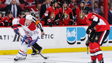 OTTAWA, ON - JANUARY 11: Ryan Poehling #25 of the Montreal Canadiens skates with the puck against Drake Batherson #19 of the Ottawa Senators in the third period at Canadian Tire Centre on January 11, 2020 in Ottawa, Ontario, Canada. (Photo by Jana Chytilova/Freestyle Photography/Getty Images)