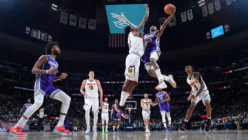 DENVER, CO - JANUARY 7: De'Aaron Fox #5 of the Sacramento Kings shoots the ball against the Denver Nuggets on January 7, 2022 at the Ball Arena in Denver, Colorado. NOTE TO USER: User expressly acknowledges and agrees that, by downloading and/or using this Photograph, user is consenting to the terms and conditions of the Getty Images License Agreement. Mandatory Copyright Notice: Copyright 2021 NBAE (Photo by Bart Young/NBAE via Getty Images)