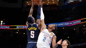 OKC Thunder guard Shai Gilgeous-Alexander (2) blocks a shot by Denver Nuggets forward Will Barton (5): Alonzo Adams-USA TODAY Sports