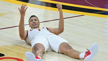 Dec 14, 2020; Cleveland, Ohio, USA; Cleveland Cavaliers guard Dante Exum (1) reacts after being fouled during the fourth quarter against the Indiana Pacers at Rocket Mortgage FieldHouse. Mandatory Credit: David Dermer-USA TODAY Sports