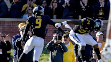 Oct 20, 2018; Columbia, MO, USA; Missouri Tigers wide receiver Jalen Knox (9) celebrates with running back Larry Rountree III (34) during the first half against the Memphis Tigers at Memorial Stadium/Faurot Field. Mandatory Credit: Denny Medley-USA TODAY Sports