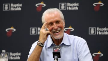 Pat Riley of the Miami Heat introduces Jimmy Butler #22 during a press conference (Photo by Issac Baldizon/NBAE via Getty Images)
