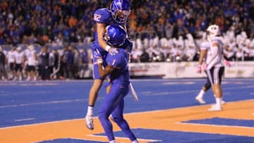 Oct 20, 2016; Boise, ID, USA; Boise State Broncos wide receiver Cedrick Wilson (1) and Boise State Broncos wide receiver Thomas Sperbeck (82) celebrate a touchdown during first half action against the Brigham Young Cougars at Albertsons Stadium. Mandatory Credit: Brian Losness-USA TODAY Sports