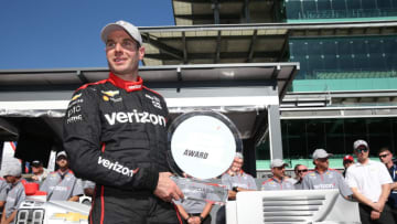 Will Power poses with his Verizon P1 Award for the IndyCar Grand Prix. Photo Credit: Chris Jones/Courtesy of IndyCar