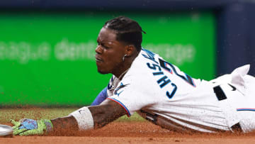 MIAMI, FLORIDA - AUGUST 15: Jazz Chisholm Jr. #2 of the Miami Marlins slides to third base against the Houston Astros during the second inning at loanDepot park on August 15, 2023 in Miami, Florida. (Photo by Megan Briggs/Getty Images)