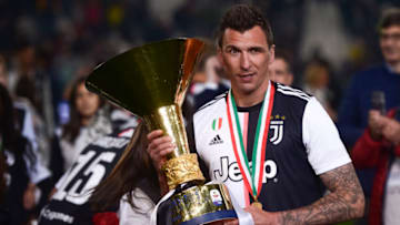 ALLIANZ STADIUM, TURIN, ITALY - 2019/05/19: Mario Mandzukic of Juventus FC holds the trophy after winning the Serie A Championship 2018-2019 (8th title in a row) at the end of the Serie A football match between Juventus FC and Atalanta BC. (Photo by Nicolò Campo/LightRocket via Getty Images)