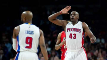 Mar 31, 2015; Auburn Hills, MI, USA; Detroit Pistons forward Anthony Tolliver (43) goes to high five guard John Lucas III (9) during the fourth quarter against the Atlanta Hawks at The Palace of Auburn Hills. Detroit won 105-95. Mandatory Credit: Tim Fuller-USA TODAY Sports