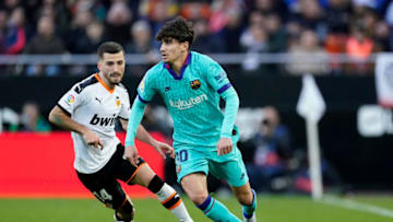 (L-R) Jose Gaya of Valencia CF, Alex Collado of FC Barcelona. (Photo by Jeroen Meuwsen/Soccrates/Getty Images)