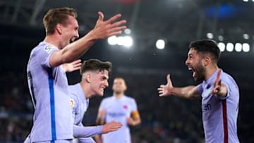 Luuk de Jong celebrates after scoring the winning goal with Pablo Gavi and Jordi Alba during the La Liga match between Levante UD and FC Barcelona at Ciutat de Valencia Stadium on April 10, 2022 in Valencia, Spain. (Photo by Quality Sport Images/Getty Images)