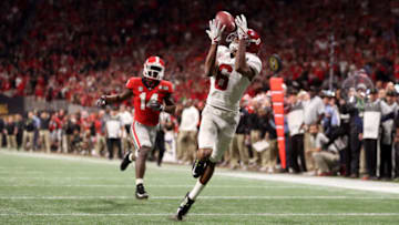 ATLANTA, GA - JANUARY 08: DeVonta Smith #6 of the Alabama Crimson Tide catches a 41 yard touchdown pass to beat the Georgia Bulldogs in the CFP National Championship presented by AT&T in overtime at Mercedes-Benz Stadium on January 8, 2018 in Atlanta, Georgia. (Photo by Christian Petersen/Getty Images)