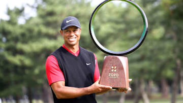 INZAI, JAPAN - OCTOBER 28: Tiger Woods of the United States poses with the trophy after the award ceremony following the final round of the Zozo Championship at Accordia Golf Narashino Country Club on October 28, 2019 in Inzai, Chiba, Japan. (Photo by Chung Sung-Jun/Getty Images)